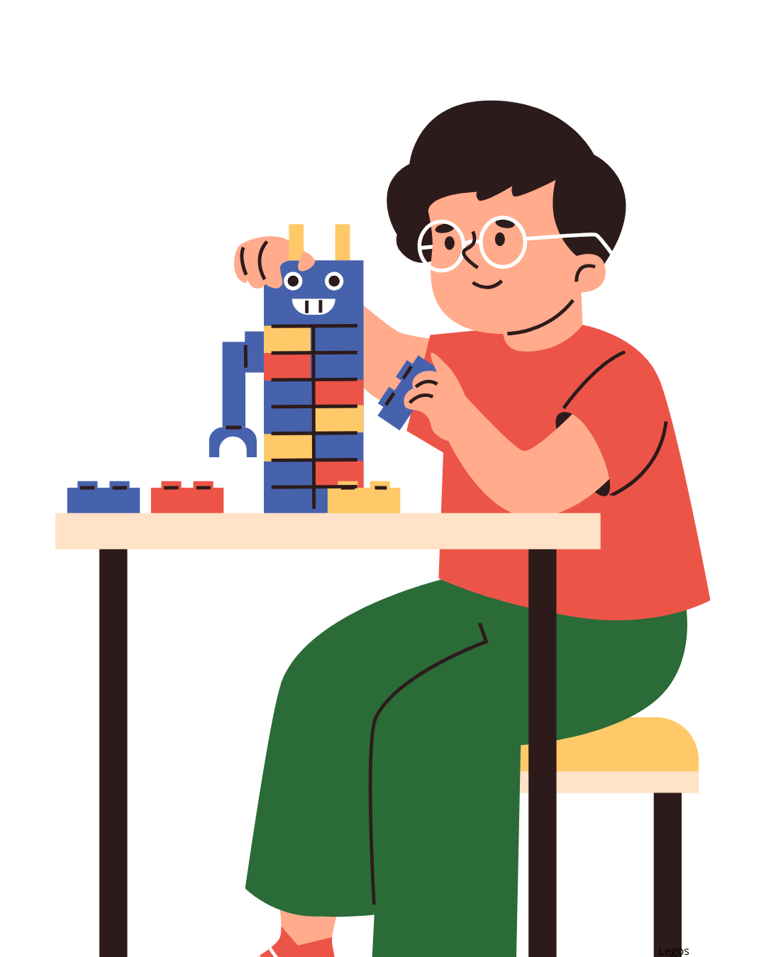 boy playing with legos